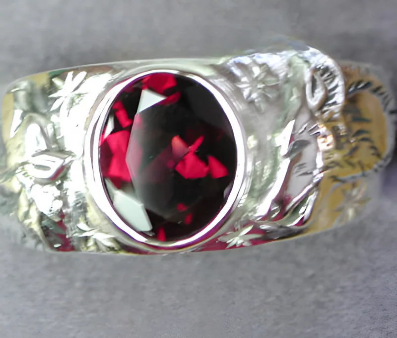 Sterling Wolf Ring with Diamond-Cut Rhodolite, by Ahern & Brucker