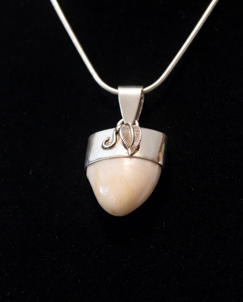 Capped Elk Ivory Pendant, by Ahern & Brucker