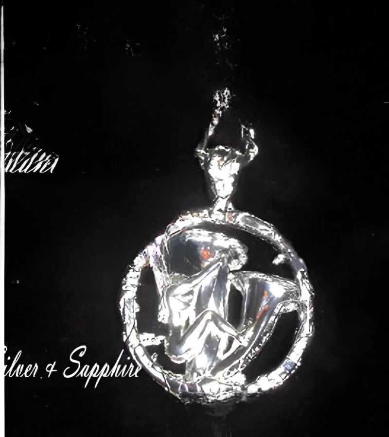 Sterling Trumpet Pendant with Sapphire, by Ahern & Brucker