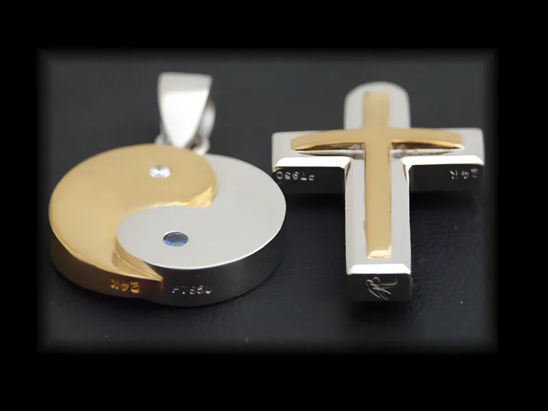 A Platinum and 24k Yin Yang and Cross