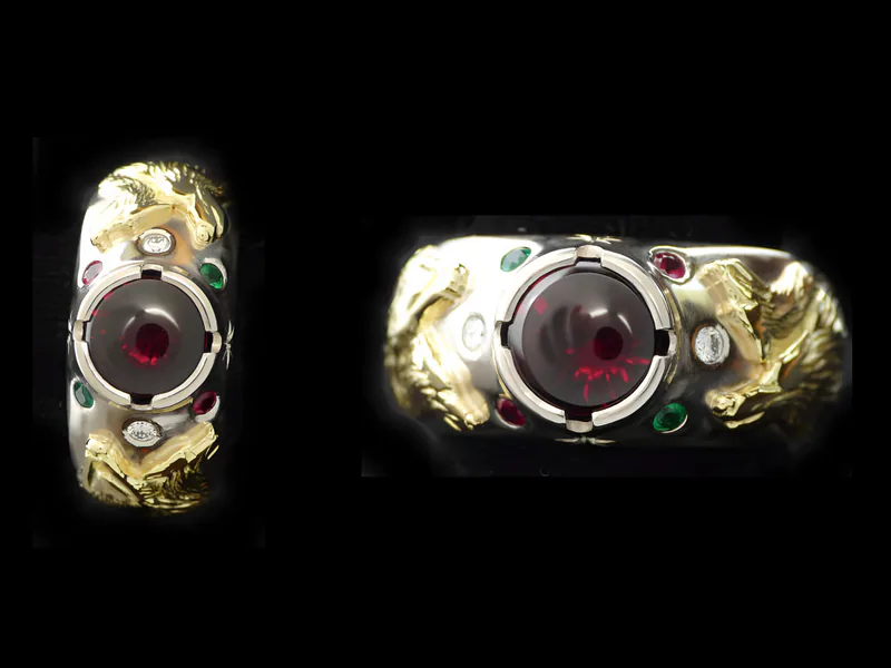 Two-Tone Wolf Ring with Rubies, Diamonds & Emeralds, by Ahern & Brucker