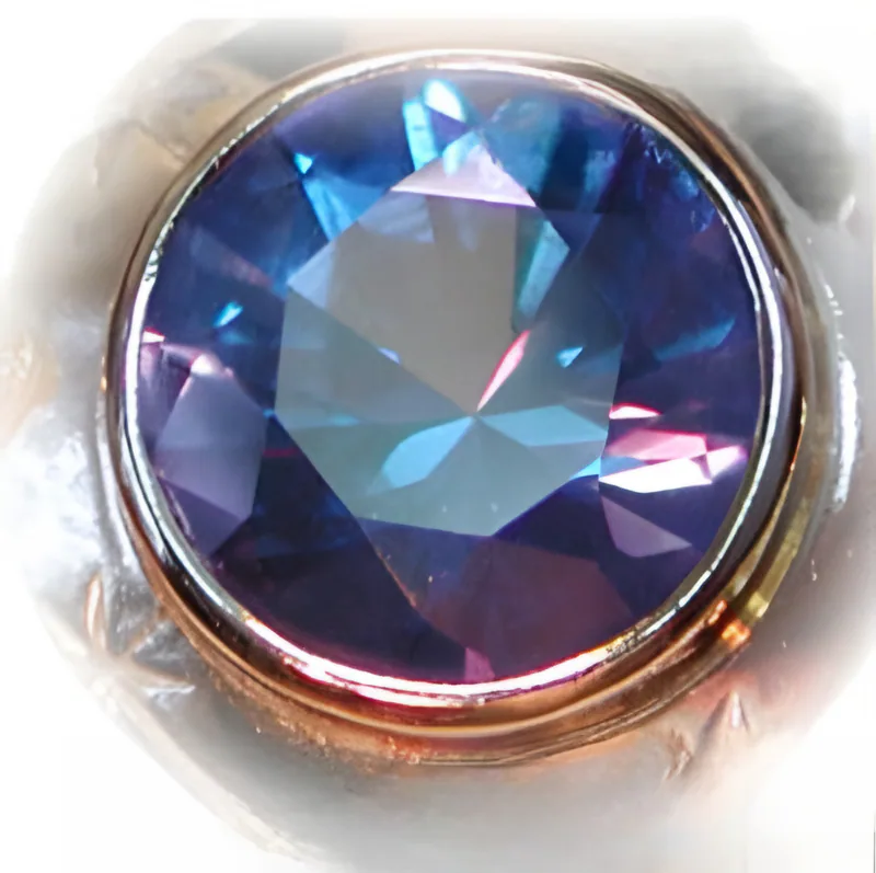 Glacier Blue Topaz Wolf Ring, by Ahern & Brucker