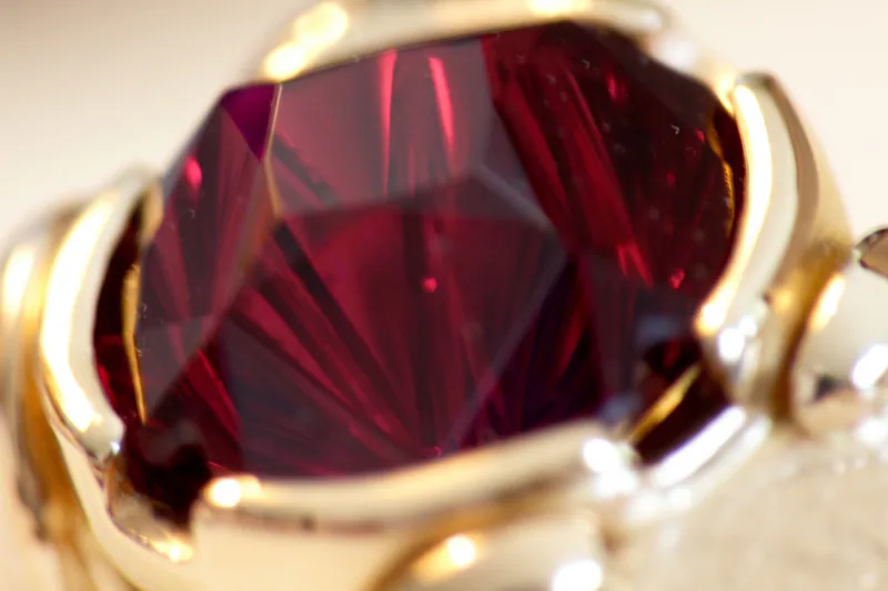 A Hand-Forged 22k Ring with a Medicine Wheel Garnet