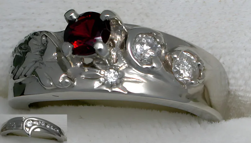 A Garnet and Diamond Wolf Wedding Set