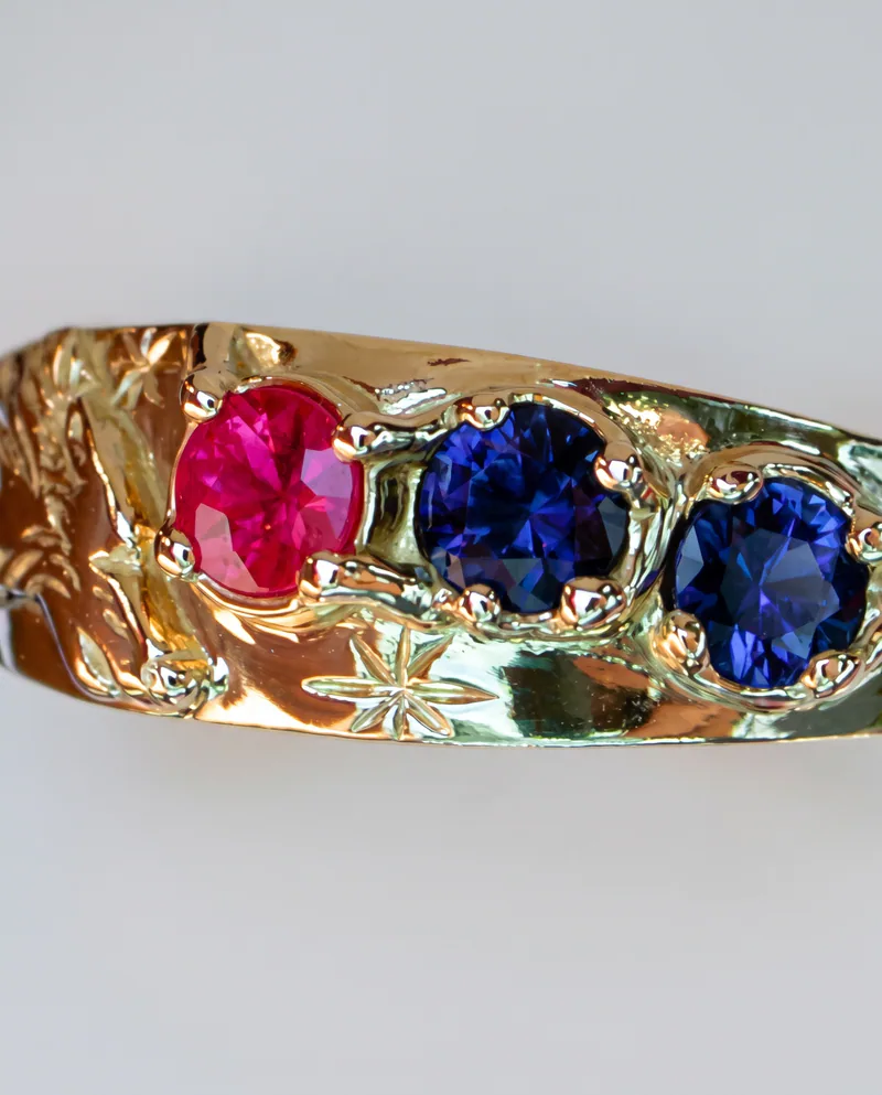 Ruby & Sapphire Wolf Ring, by Ahern & Brucker