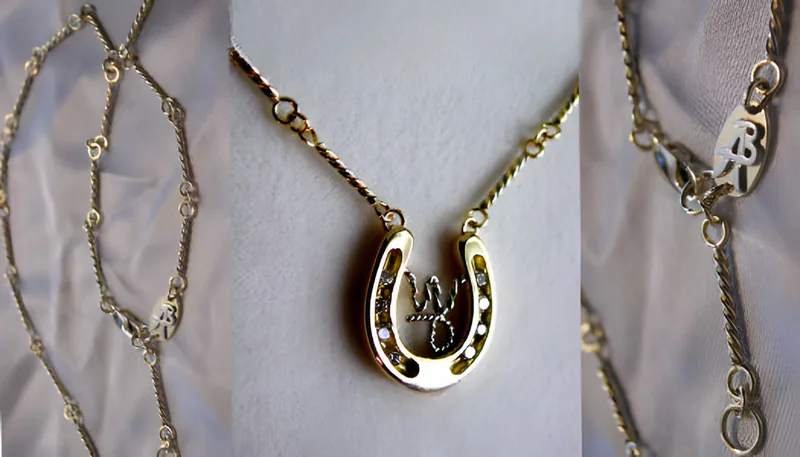 A Diamond Horseshoe Pendant with a Ranch Brand