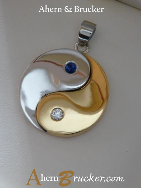 A Platinum and 22k Yin Yang Pendant